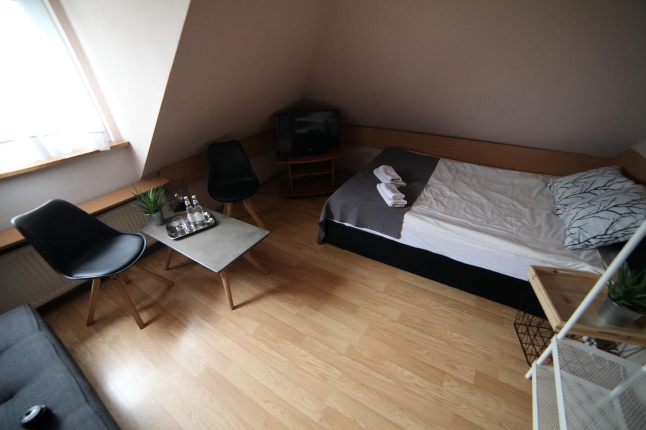 Mansarda Noclegi Września Quarto foto